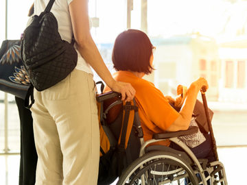 How can the travel experience be improved for disabled travelers?