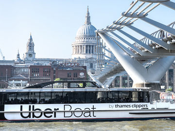 Uber sees first-ever quarterly profits while eyeing travel tours markets